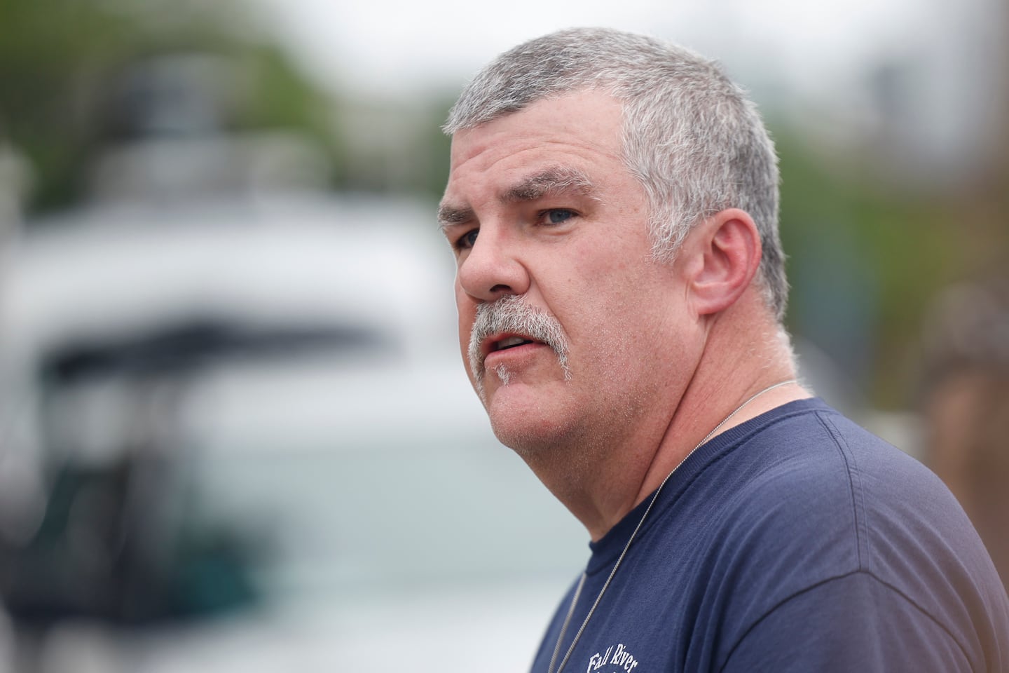 Fall River firefighter Michael O’Reagan speaks during a press conference in front of the Gabriel House Assisted Living Facility, the scene of a fatal fire, on July 14, 2025, in Fall River.  