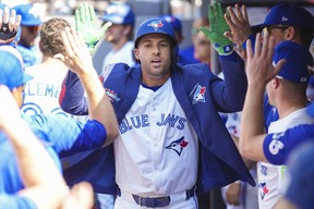 Toronto Blue Jays' George Springer celebrates after slugging a home run against the Angels on Saturday. CHRIS YOUNG/THE CANADIAN PRESS