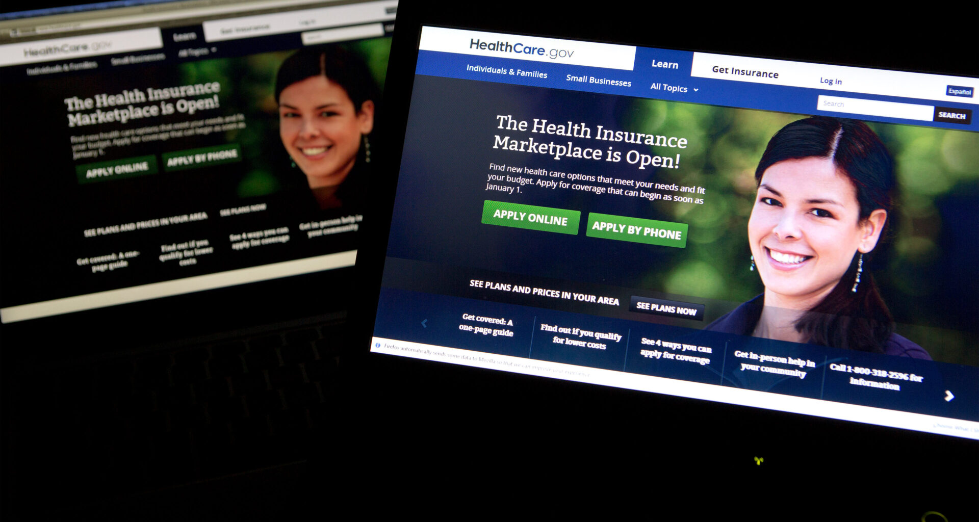 A photo of two laptops with the HealthCare.gov website open.