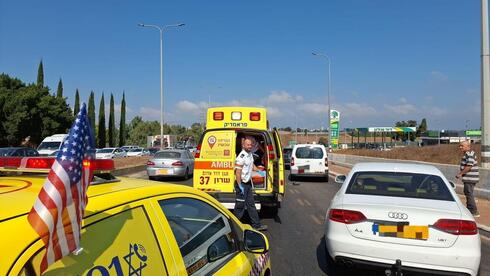 Car crashes into bus stop near Netanya injuring 7, manhunt on for attacker