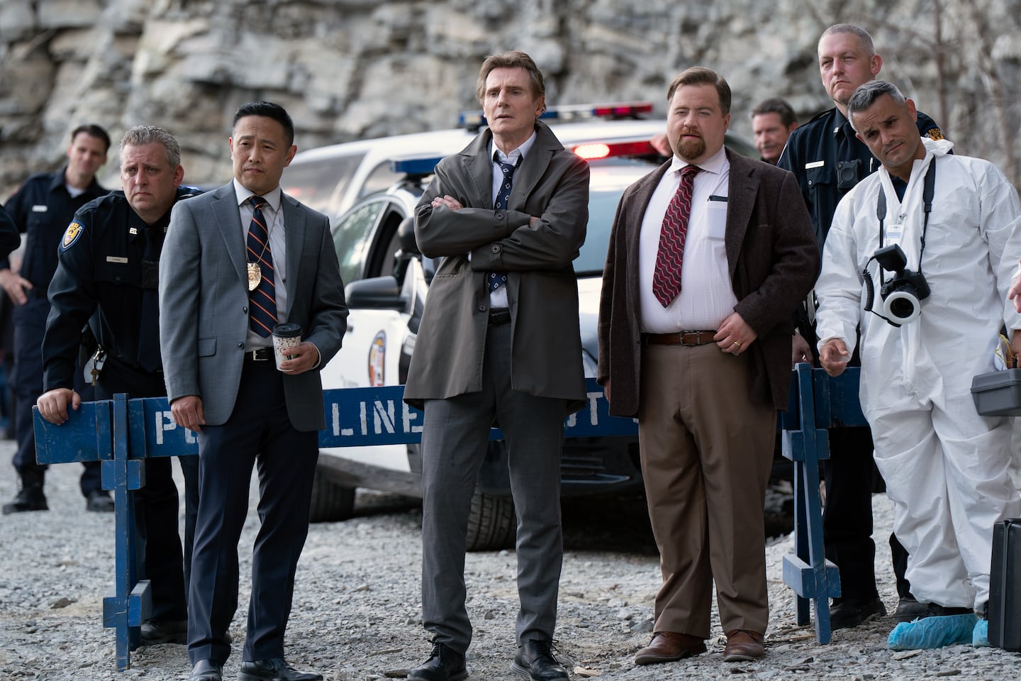 From left: Eddie Yu as Detective Park, Liam Neeson as Frank Drebin Jr., and Paul Walter Hauser as Ed Hocken Jr. 