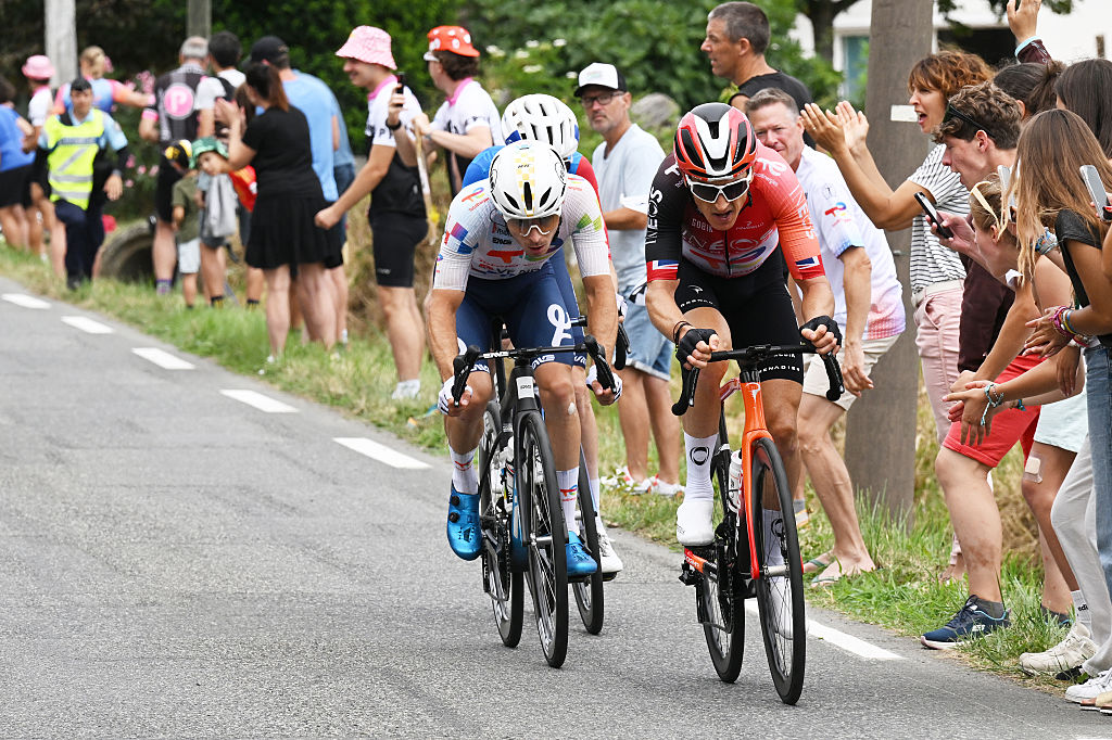 LUCHON-SUPERBAGNERES, FRANCE - JULY 19: (L-R) Matteo Vercher of France and Team TotalEnergies and Geraint Thomas of Great Britain and Team INEOS Grenadiers attack during the 112th Tour de France 2025, Stage 14 a 182.6km stage from Pau to Luchon-Superbagneres 1794m / #UCIWT / on July 19, 2025 in Luchon-Superbagneres, France. (Photo by Tim de Waele/Getty Images)