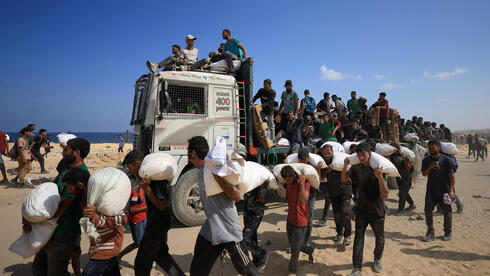 Israel speeds up Gaza humanitarian aid flow under global pressure, officials say