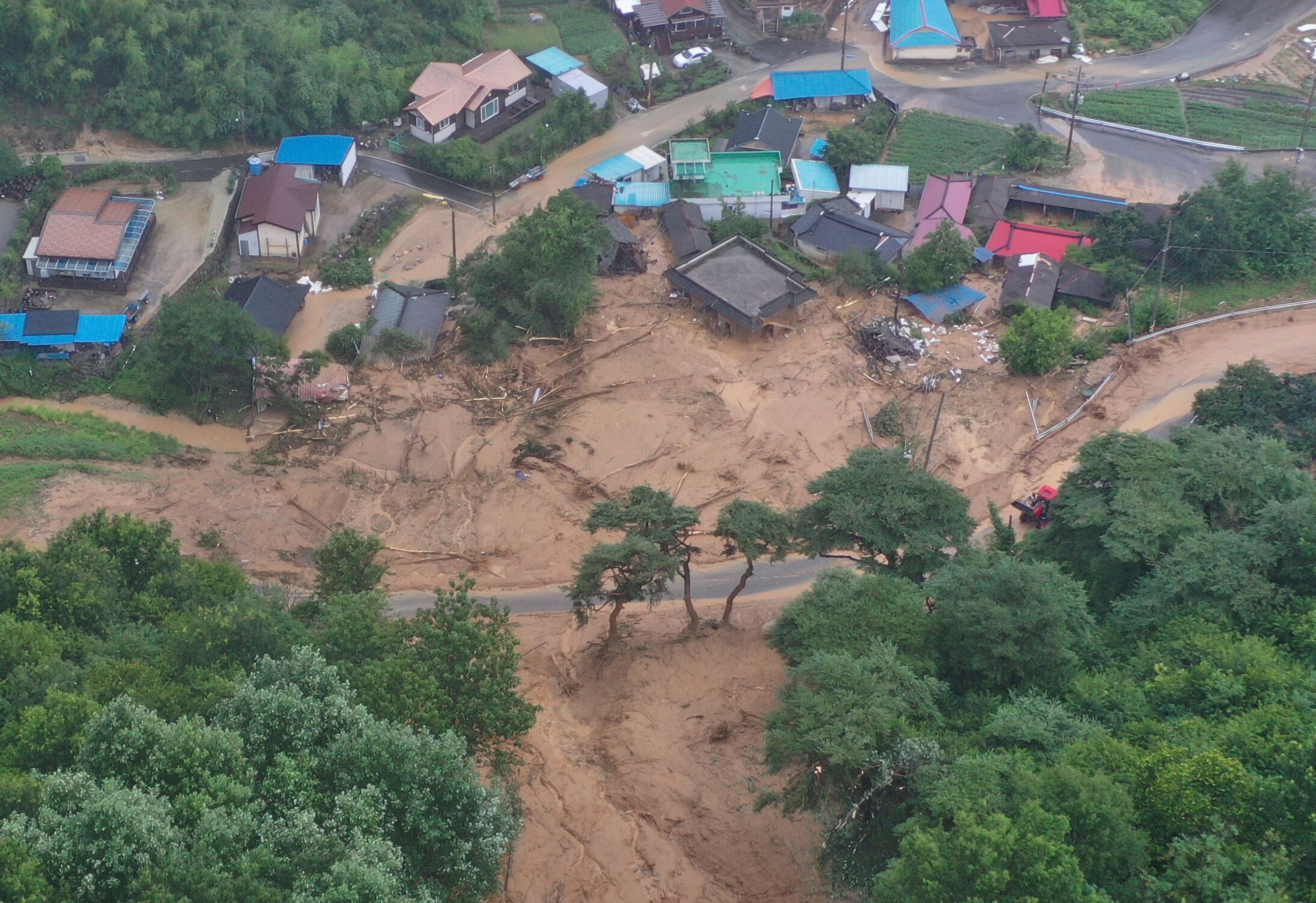 Houses collapsed from a landslide are seen in Sancheong, South Korea, on 19 July 2025