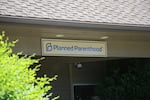 FILE - The bill imposes a one-year ban on state Medicaid payments to Planned Parenthood and some other health care nonprofits that provide abortions. The front of the Planned Parenthood clinic in Bend, Oregon, in this June 28, 2022, file photo.