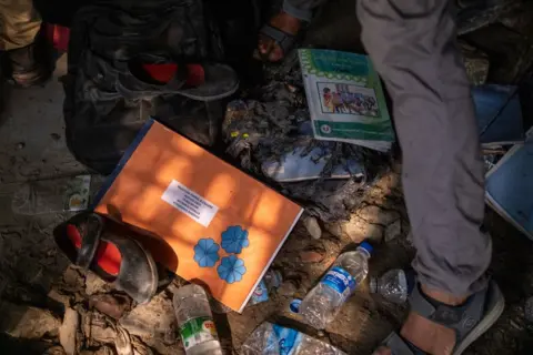 Syed Mahamudur Rahman/NurPhoto/Getty Images A view of the crash site at Milestone School in Dhaka, Bangladesh, on July 22, 2025. 
