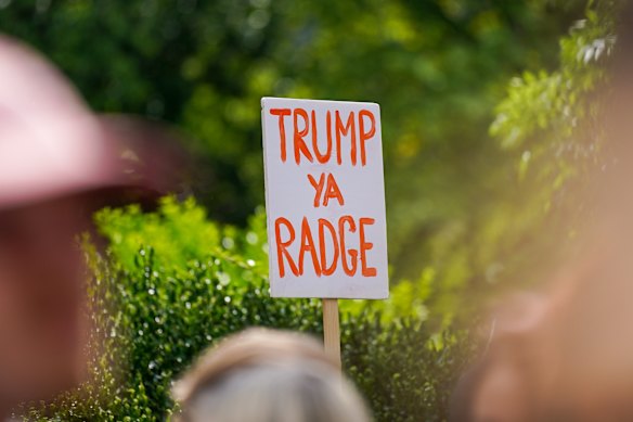 A protester uses Scottish slang to take aim at Trump in Edinburgh.