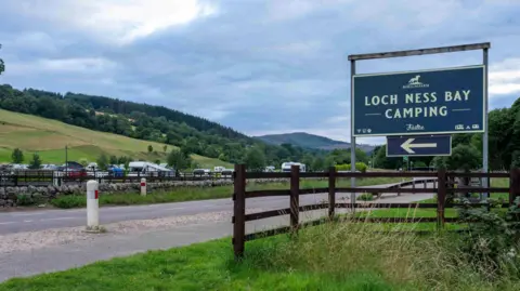 Brian Smith A camp site sign saying LOCH NESS BAY CAMPING