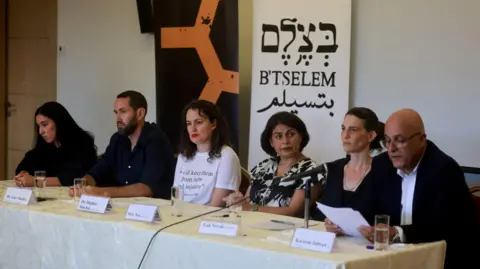 Reuters Israeli human rights groups B'Tselem and Physicians for Human Rights-Israel hold a news conference in occupied East Jerusalem to release reports accusing Israel of genocide in Gaza (28 July 2025)