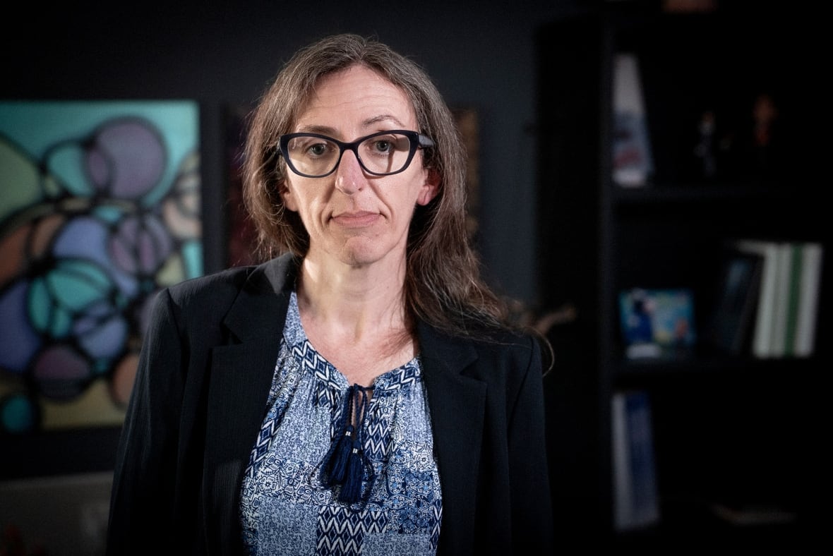 A woman with glasses.