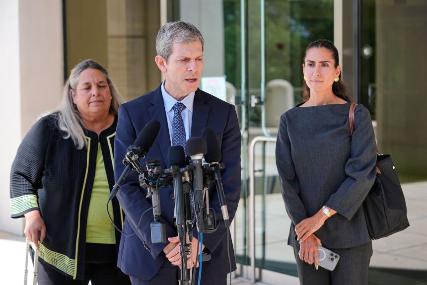 David Oscar Markus, attorney for Ghislaine Maxwell, center, speaks during a news conference outside the federal courthouse in Tallahassee, Florida, on Thursday, July 24.