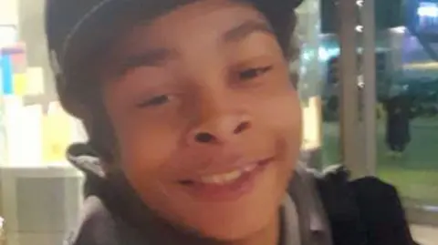 Met Police Undated family handout file photo of Kelyan Bokassa in a cap.