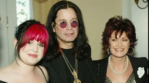 Getty Images Kelly, Ozzy and Sharon Osbourne in 2004