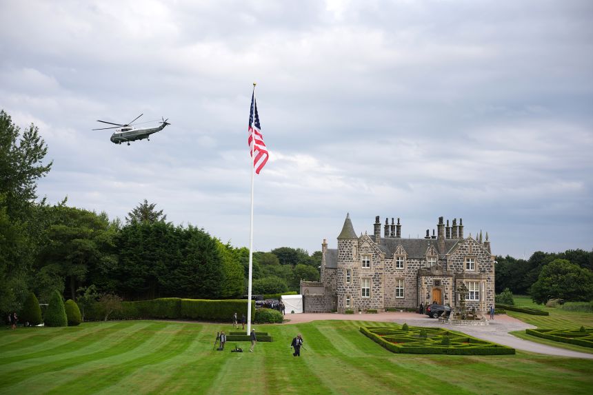 President Donald Trump and British Prime Minister Keir Starmer arrive on the Marine One helicopter at Trump International Golf Links on July 28 in Balmedie, Aberdeenshire, Scotland. 