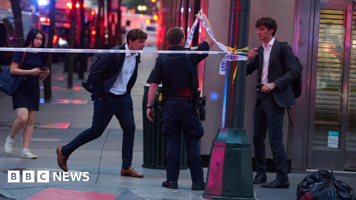 Police officer among four killed in New York office building shooting