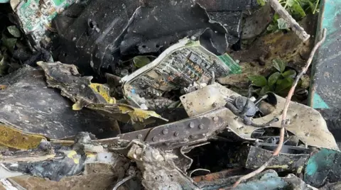 Getty Images A view of the destruction at Milestone School and College after a Bangladesh Air Force training jet crashed into the campus in Dhaka