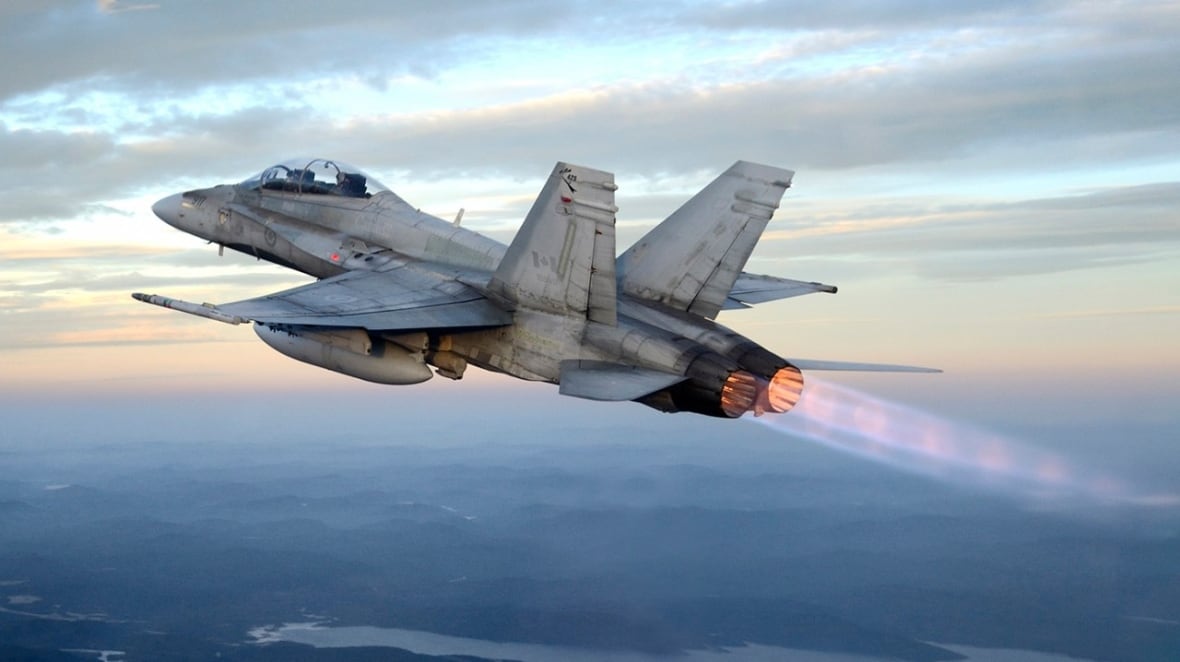 A CF-18 Hornet Canadian fighter jet in flight