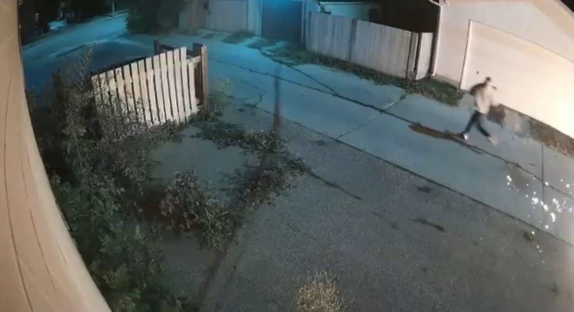 a mans runs from a spark