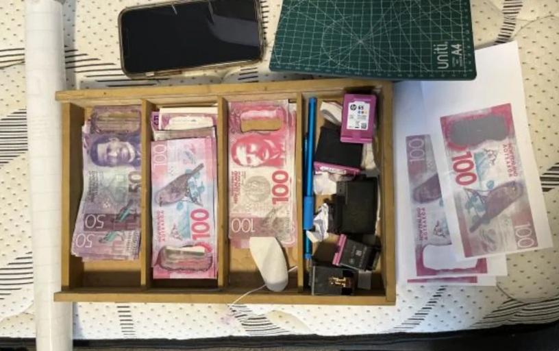 Thousands in counterfeit cash seized after dodgy Facebook Marketplace deals