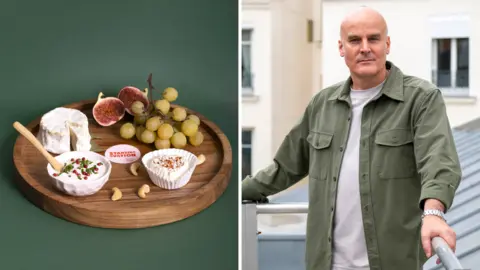Studio Lazareff/Antoine Repesse A selection of Standing Ovation's cheeses on a cheese board with figs and grapes (left) and (right) Yvan Chardonnens standing on a rooftop wearing a dark green shirt over a white t-shirt.