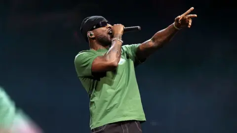 Getty Images Skepta in a green t-shirt