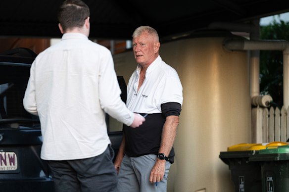 Mark Smyth being approached by a journalist in Brisbane.