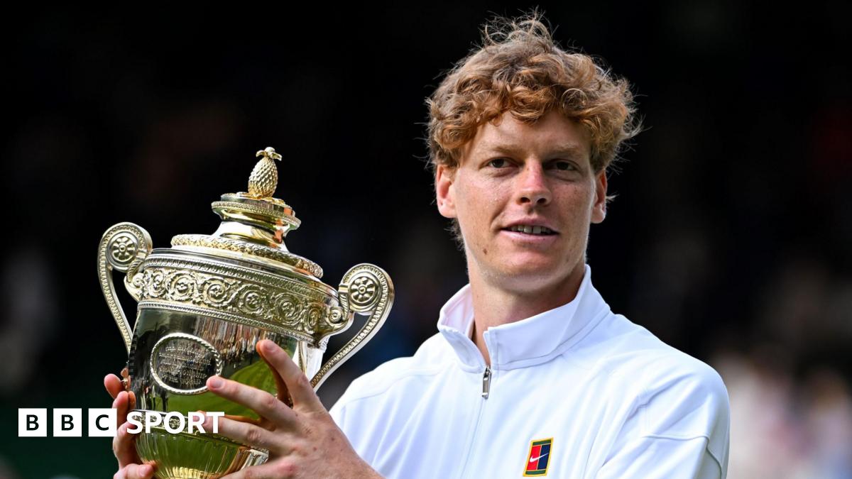 Jannik Sinner lifts the Wimbledon men's singles trophy