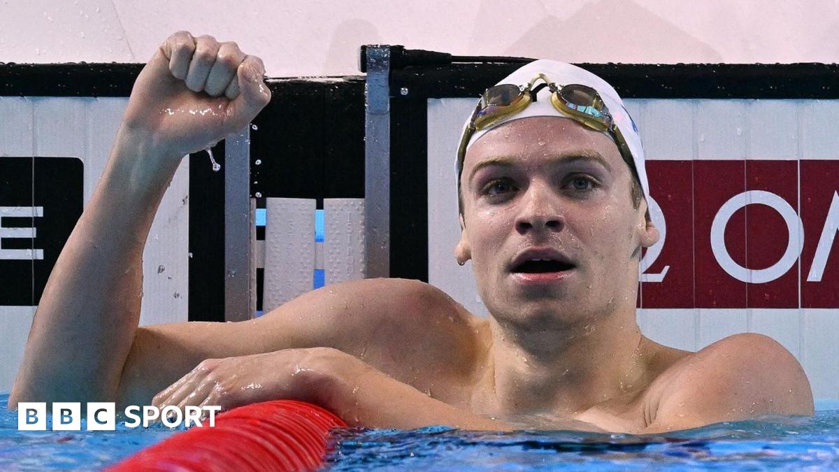 France's Leon Marchand celebrates winning gold at the World Aquatics Championships in Singapore.