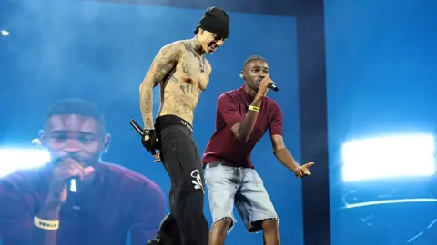 Getty Images Dave and Central Cee perform together