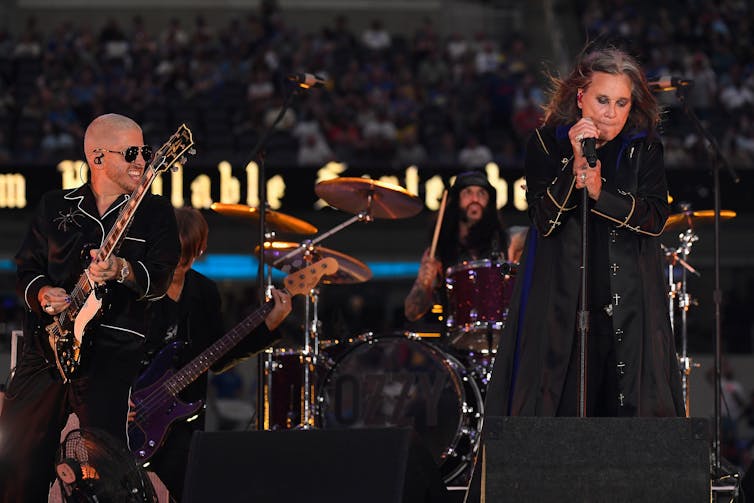 Osbourne behind the microphone.