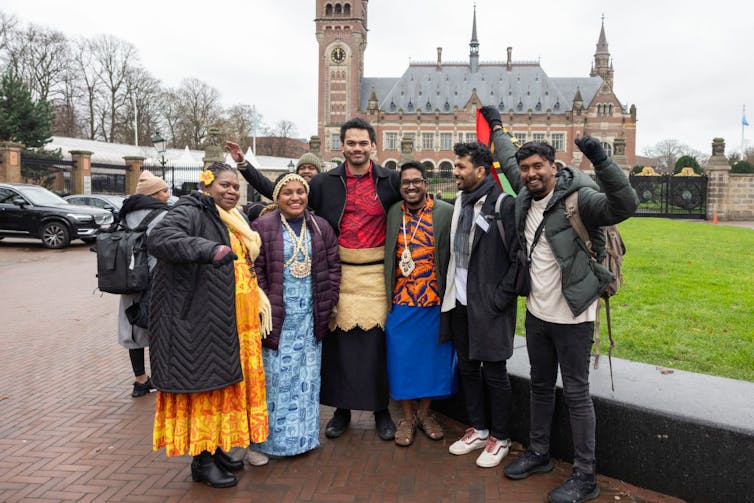 Group of Pacific Islanders looking happy