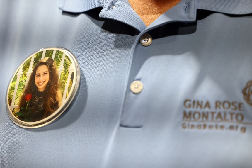 Anthony Montalto wears a button with an image of his daughter, Gina Montalto, 14, who was killed in the 2018 Marjory Stoneman Douglas High School shooting.