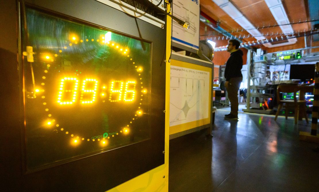 An atomic clock in the time laboratory of the Physikalisch-Technische Bundesanstalt (PTB) in Germany. These devices use lasers and atoms to calculate time with extreme precision.