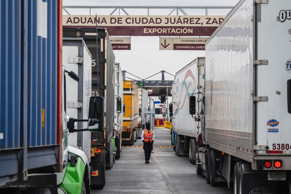 Tractor-trailers wait in line at the Ysleta-Zaragoza International Bridge port of entry, on the US-Mexico border in Juarez, Mexico, on April 3.