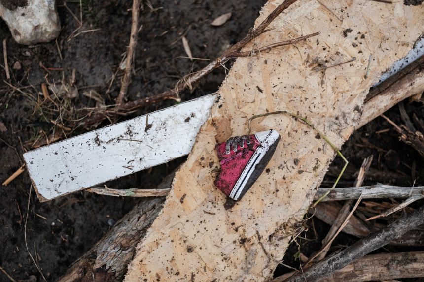 A baby shoe is seen in Ingram, Texas, on Tuesday.