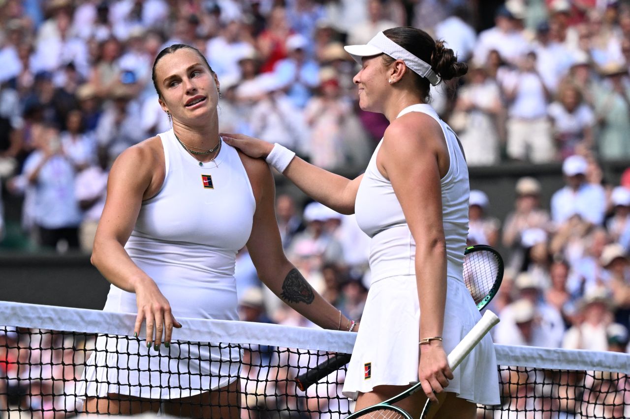 Aryna Sabalenka, left, greets Amanda Anisimova at the net following their semifinal match.