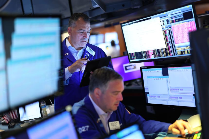 Traders work on the floor of the New York Stock Exchange in New York City on July 08th.