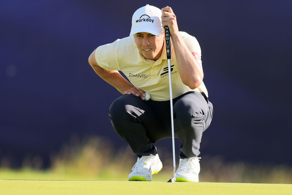 Matt Fitzpatrick lines up a putt on the 12th green.