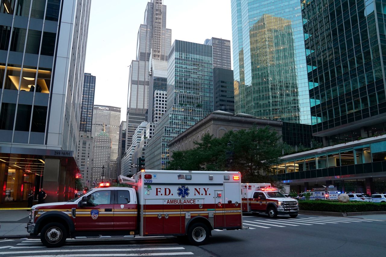 Firefighters' trucks and police vehicles are seen as police respond to a shooting incident in New York on Monday.
