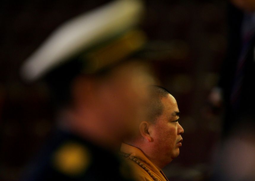 Shaolin Temple abbot Shi Yongxin attends a meeting of the National People's Congress at the Great Hall of the People on March 8, 2008 in Beijing, China.