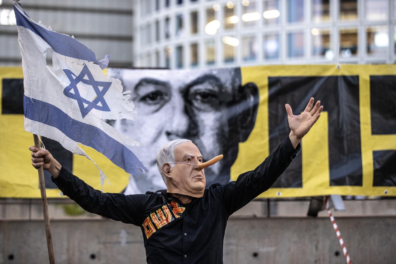Protester wearing a Netanyahu mask in Tel Aviv, accessed on June 15, 2025. (AA Photo)