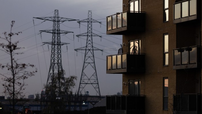 Residential flats next to electricity pylons