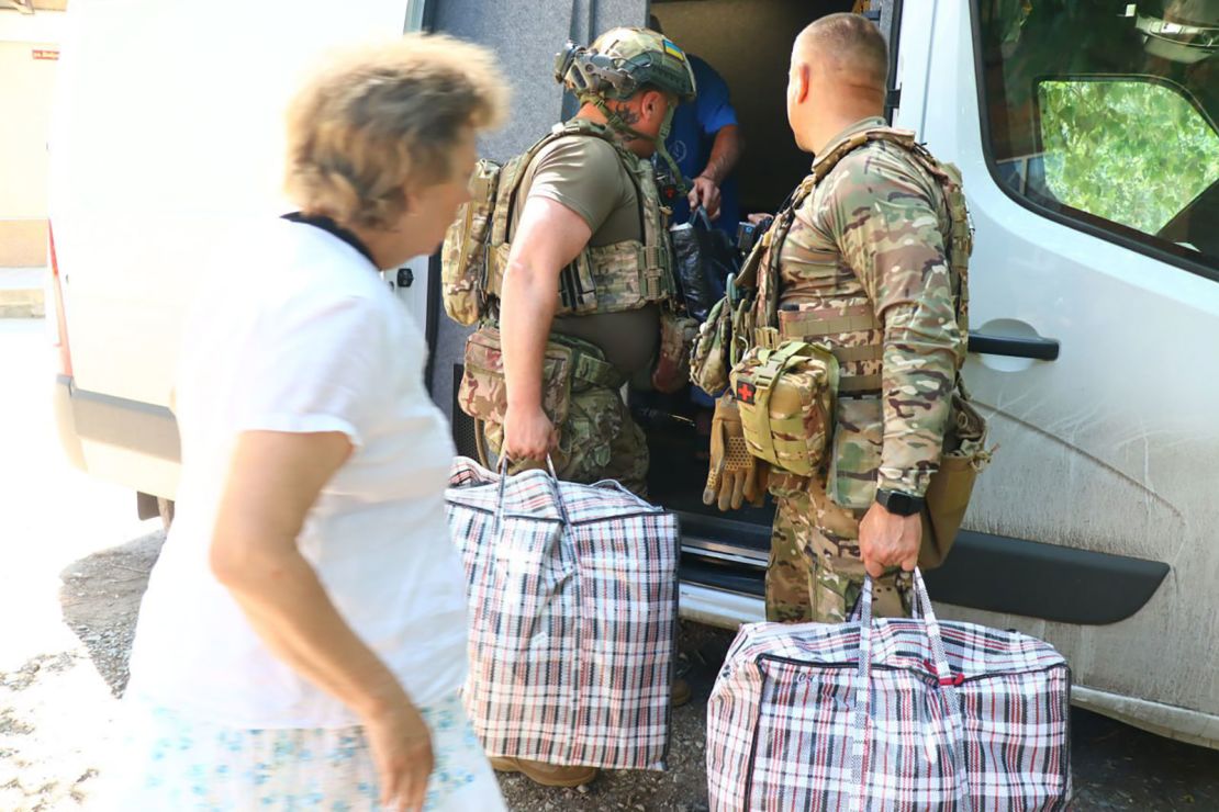 A special Ukrainian police force helps evacuate some of the last civilians from Kostantynivka, Ukraine, on July 16, 2025. Residents there have faced daily bombardment.