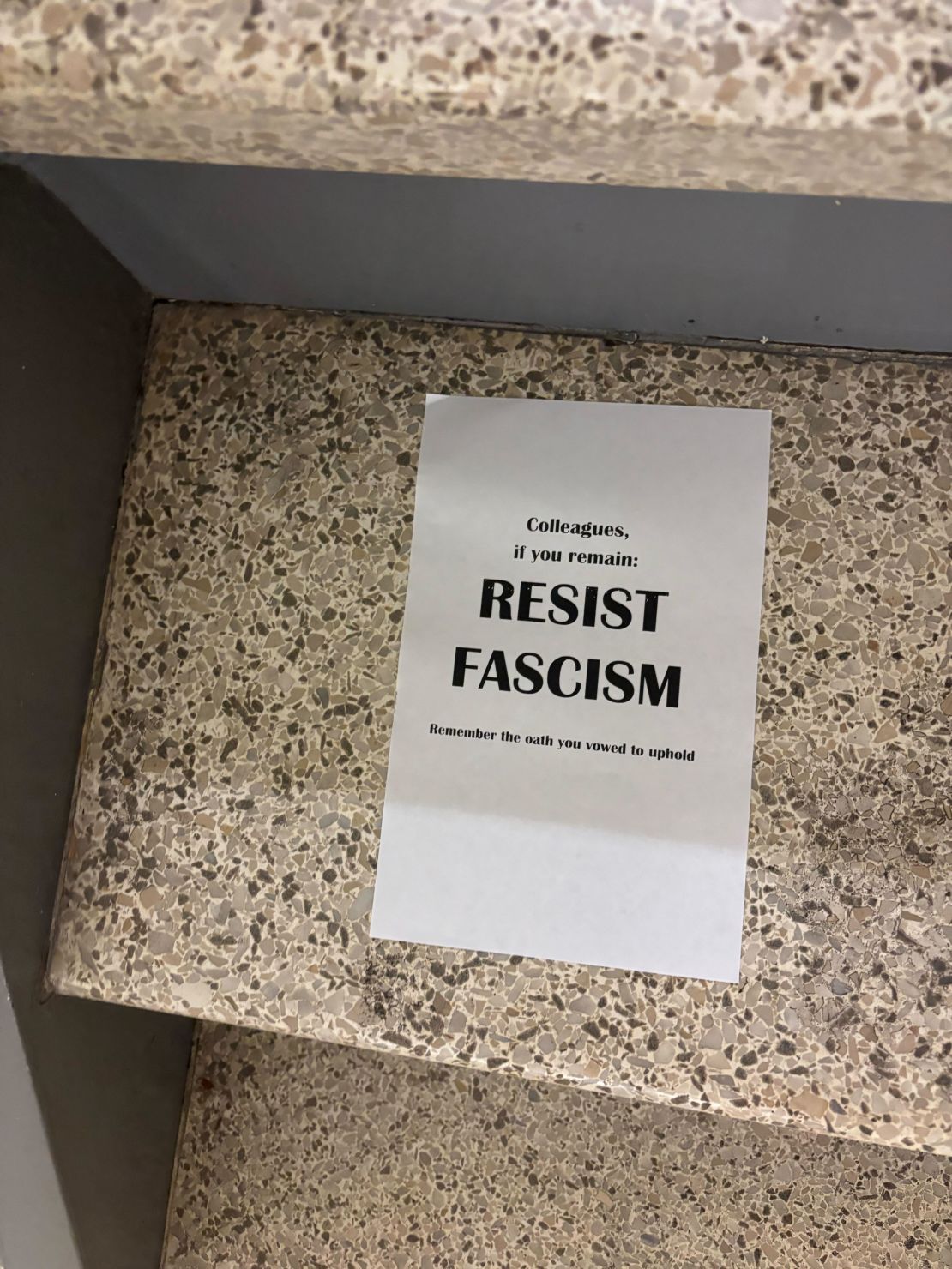 A sign is seen on the steps inside the US State Department headquarters in Washington, DC, on July 11.