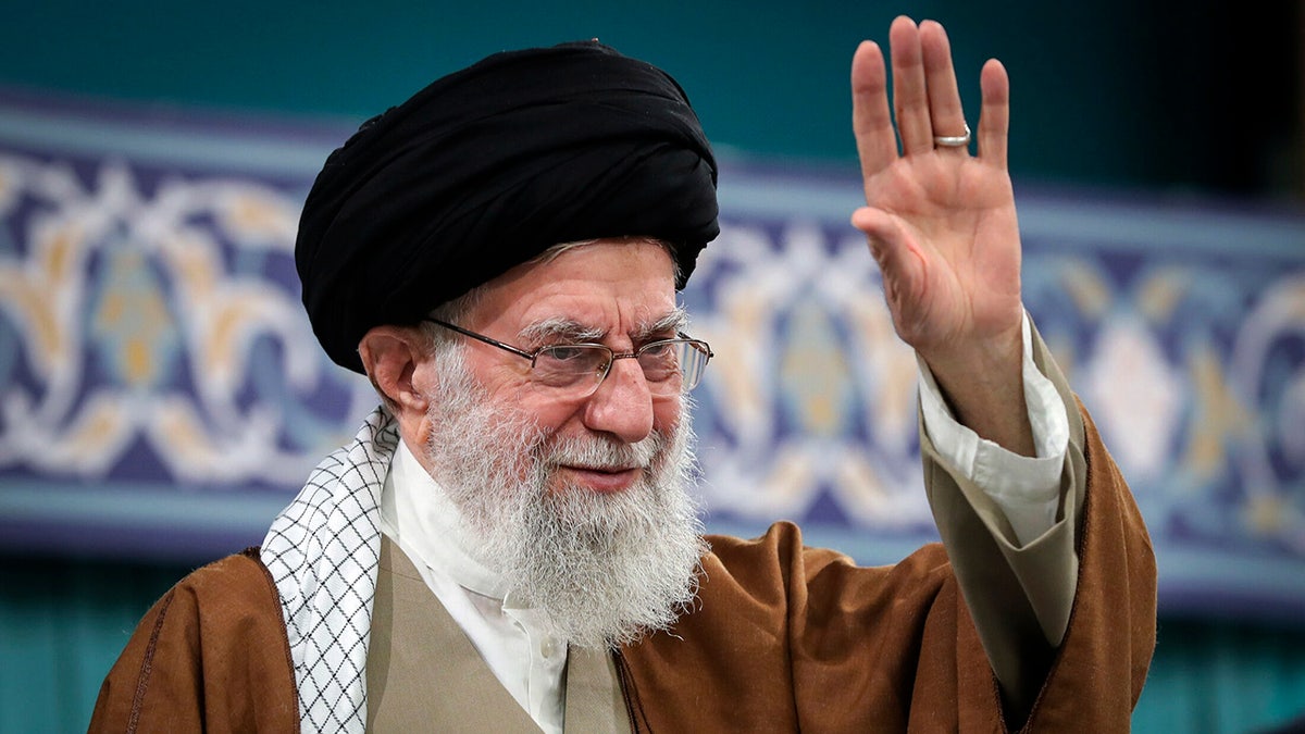 Iran's leader Khamenei waves