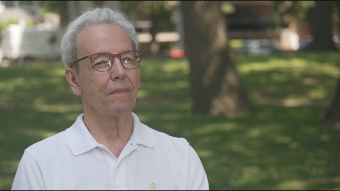 Man with glasses in a park