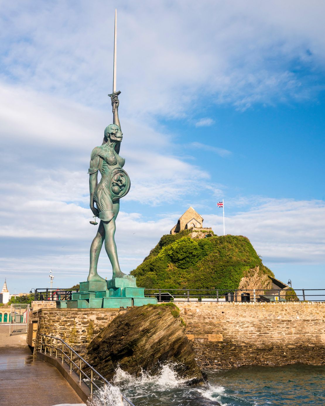 Verity, created by artist Damien Hirst, stands on the pier in Ilfracombe, Devon in the UK.