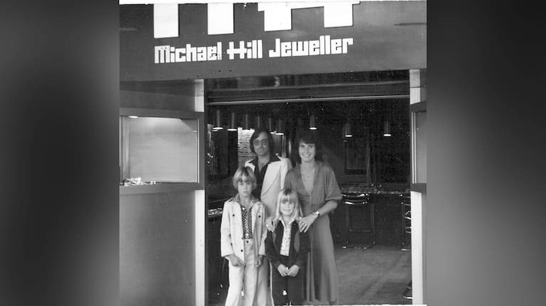 Sir Michael Hill and his family in front of one of one of the early stores. 