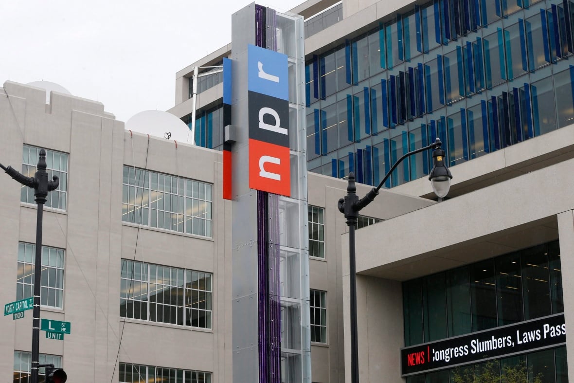 A sign with the logo of National Public Radio stands outside its headquarters in Washington, D.C.