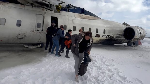 Flight attendant says Delta put 'profits over safety' in Toronto plane crash